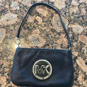Black leather MK wristlet …. New … excellent condition